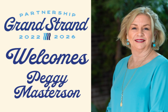 partnership grand strand welcomes peggy masterson with photo of peggy smiling in bright blue blouse