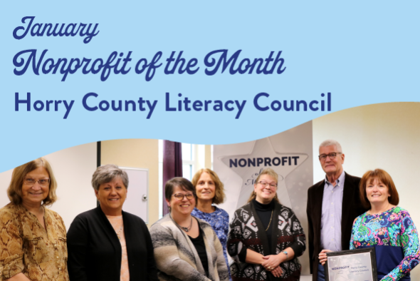 Horry county Literacy Council smiles while holding award plaque