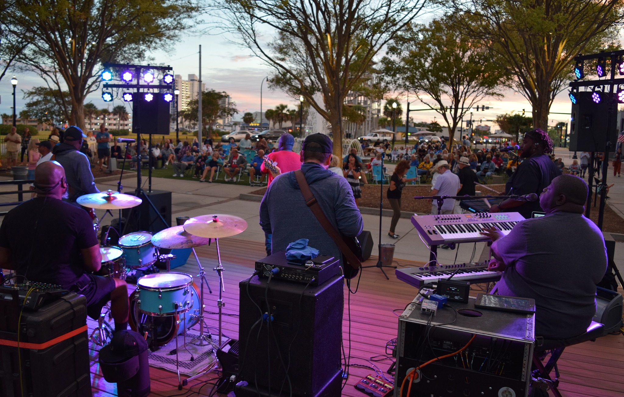 band performs to crowd at nance plaza in myrtle beach