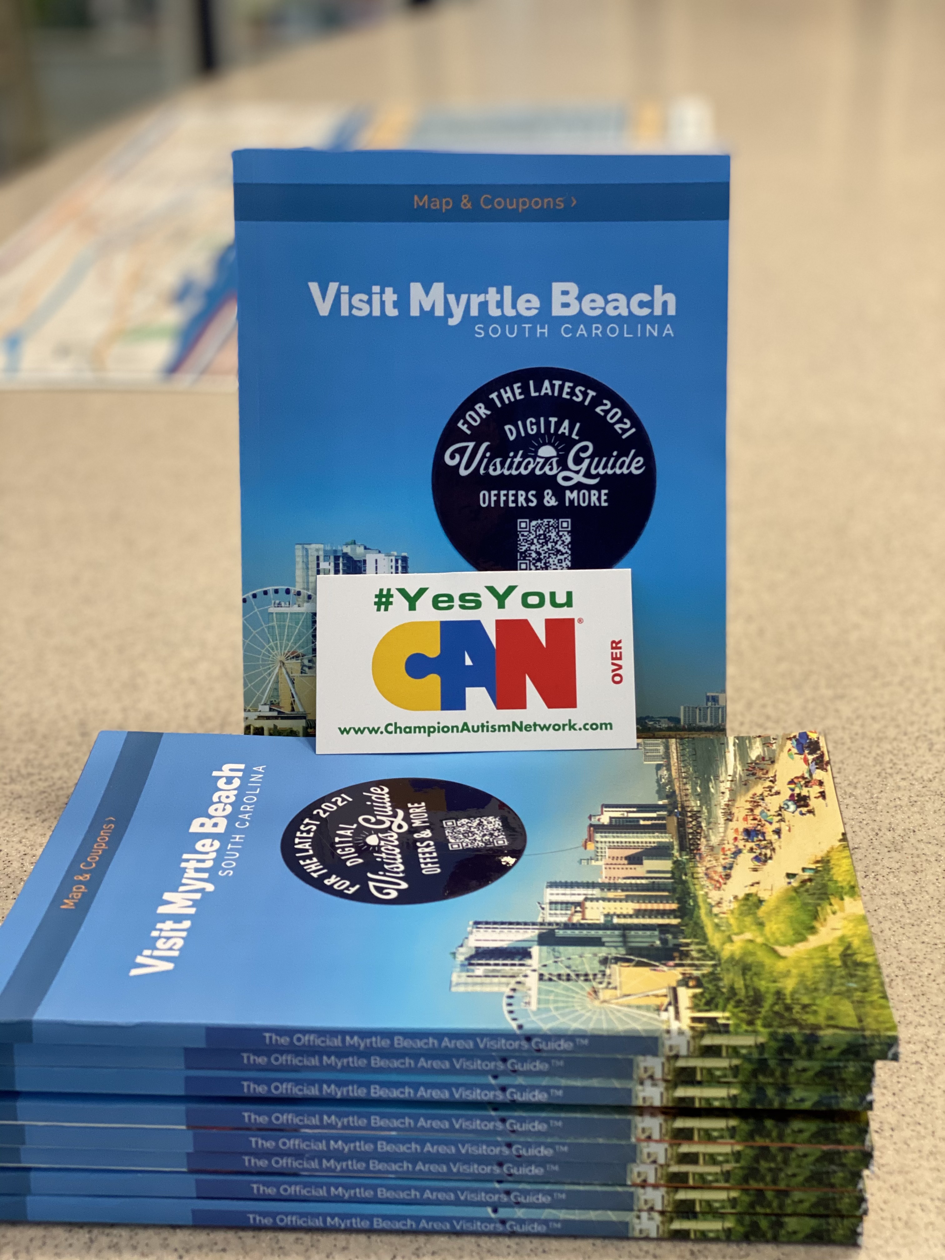 visit myrtle beach coupon book and champion autism network card